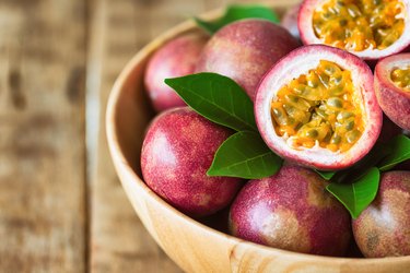 High-fiber food passionfruit in a bowl on a wood table